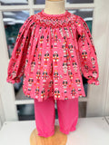 Celebrate the season with Cape Point Clothing Co.’s Nutcracker Bishop Pant Set! A charming pink nutcracker blouse paired with cozy pink corduroy pants wraps your toddler in warmth and festive joy, making chilly days feel magical and stylish. Perfect for creating unforgettable holiday memories.