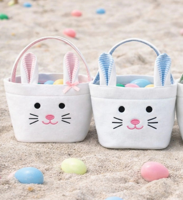 Hippity-hopping its way into our bestselling Bunny Basket assortment, the Bitty Bunny Basket proves that anything is more precious when it’s mini-sized! Cutely crafted of classic pastel seersucker and durable canvas, this portable tiny tote is the perfect accessory for egg hunt adventures for the littlest of tots.  Add a name to the back for that extra special personalized touch!

Easter Bunny-approved bunny face ready for springtime celebrations
Perfect for kids of all ages, especially walkers/toddlers
Gre