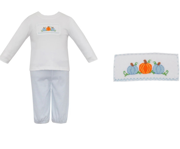 The Boys Long Sleeve Pumpkin Smocked Pant Set is a festive autumn ensemble that blends comfort with seasonal charm. The long‑sleeved knit top in crisp white cotton features a rectangular embroidered panel across the chest, showcasing three pumpkins, two in soft blue flanking a classic orange, with delicate green vines and a light‑blue wavy border for boutique detail.