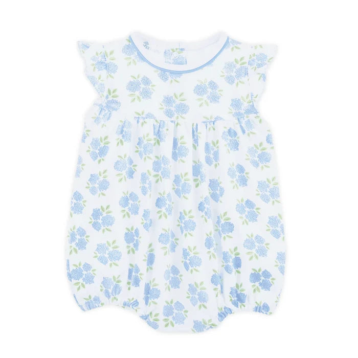 Light, playful, and effortlessly sweet, the Magnolia Baby Dreamy Hydrangeas Print Flutter Bubble in sky blue is a charming outfit for your little girl. Crafted from luxuriously soft 100% Pima cotton, this baby bubble offers breathable comfort while remaining gentle on delicate skin.