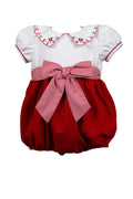Dress your little girl in the charming Girls Luciana Loop Bubble from The Proper Peony. Featuring a crisp white Peter Pan collar, delicate red embroidery, and a sweet front bow, this two-toned bubble suit adds festive flair to any holiday occasion. Comfortable and stylish, it’s designed to keep your child looking adorable and feeling cozy all day long.&nbsp;