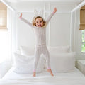 Give your little one the gift of comfort and joy with the Grayson Girls’ Pajama Pant Set in Easter Bunnies Pink by Lila and Hayes! Crafted from soft Pima cotton, this long sleeve set features an adorable Easter bunnies print, making bedtime an enchanting adventure. Let their dreams hop into a world of fun!