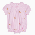 A darling pink corduroy bubble featuring allover embroidered dogs, sweet puff sleeves, and a classic Peter Pan collar with ric rac trim. Finished with gentle leg elastic and snap closures for easy changes—perfect for everyday wear or special occasions.