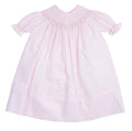 The Infant Girls Ruffle Sleeve Bishop Dress by Feltman Brothers is a delightful blend of elegance and charm. Its soft pink hue, classic smocking, and ruffle sleeves create an enchanting look, perfect for capturing precious moments. This heirloom-quality piece promises to be cherished for years to come!