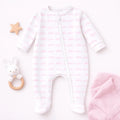 Celebrate the special bond between siblings with Magnolia Baby’s Little Sister Print Zip Footie! Crafted from luxurious Pima Cotton, this footie offers unparalleled softness and comfort for your little one. The design features an all-over "little sister" print in a gentle pink, highlighting her special role.