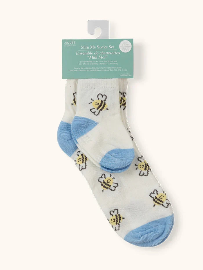 Mom and Baby can have cozy and coordinating feet with the Mama & Me Socks Set from JuJuBe × Studio Oh! Made of polyester and spandex for ultra-comfort, these cute and colorful matching socks are perfect for photos, lounging around the house, and making a “twinning” fashion statement on the go. The socks feature irresistible, on-trend designs that make a stylish addition to any mama-and-baby ensemble. The baby socks are for babies 3 to 12 months, and adult socks are one-size-fits-most.