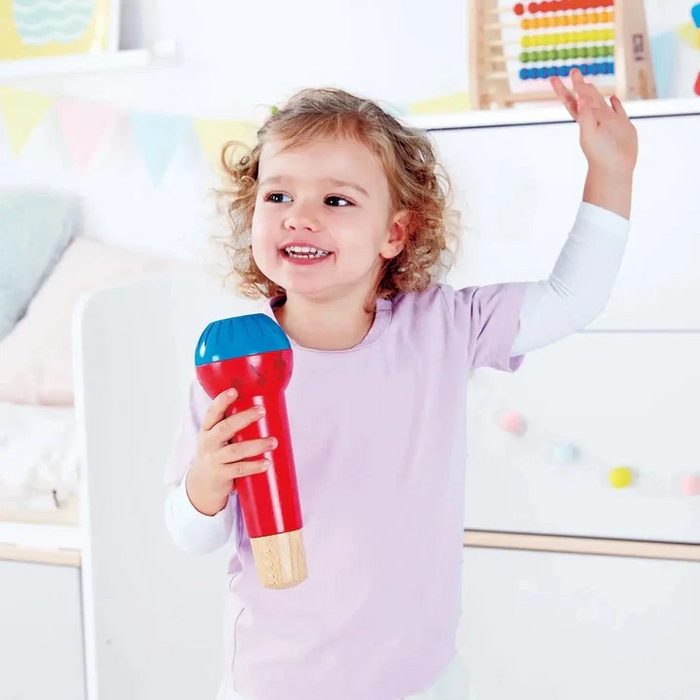 The Mighty Echo Microphone is perfect for children aged 12 months and up who love to sing and perform. This battery-free toy adds a fun echo effect to any voice, inspiring creativity without the need for power. Its vibrant primary colors and musical note design make it an eye-catching accessory for solo performances or group play. Let your little one unleash their inner pop star and enjoy endless musical fun with the Mighty Echo Microphone.