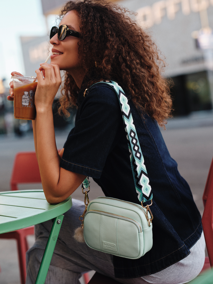 Spearmint Original Bag showing exterior pockets and gold hardware | Pom Pom London