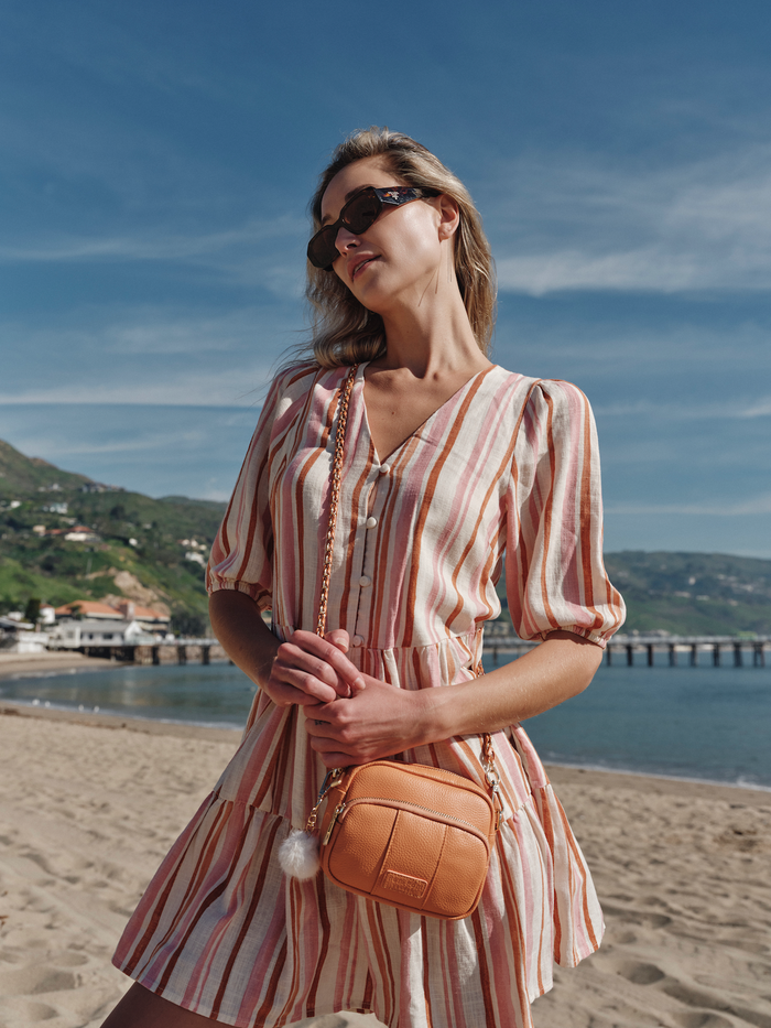 Mango Tango Original Mini Bag showing exterior pockets and gold hardware | Pom Pom London