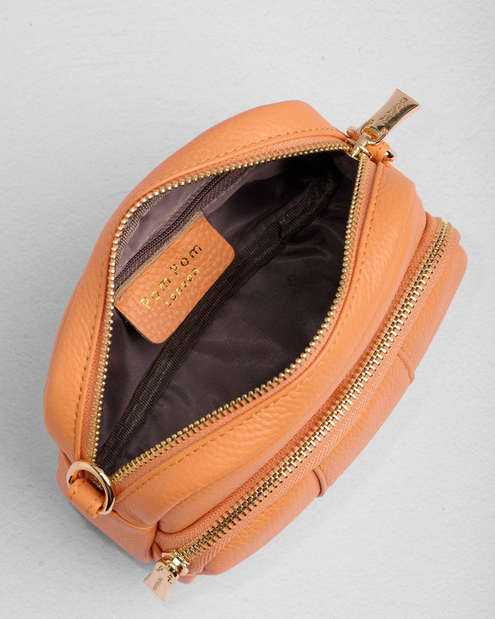 Original Mini Bag in Mango Tango styled with free fabric strap and keyring | Pom Pom London