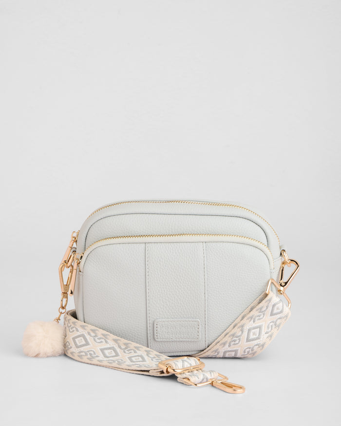 Original Plus Bag in Salt Grey full-grain leather close-up | Pom Pom London