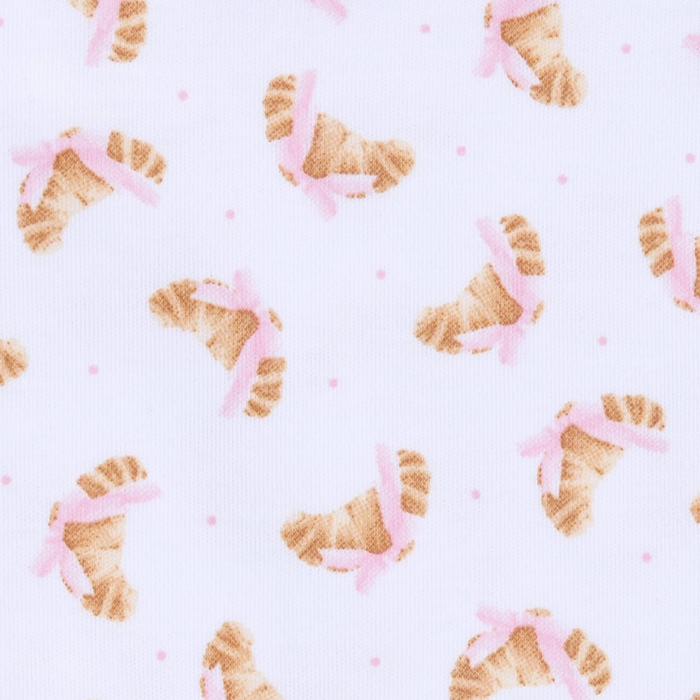 Wrap your little one in pure comfort with this charming Petit Croissant Print Zip Footie from Magnolia Baby. Crafted from 100% luxurious Pima cotton, this footie is incredibly soft and breathable—perfect for sensitive skin. The adorable all-over croissant print adds a whimsical touch to bedtime, while the innovative two-way zipper makes diaper changes effortless, even during those late-night moments.&nbsp;