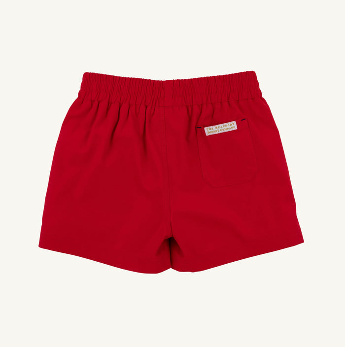 Celebrate summer in style with the Prepletic Sheffield Shorts in vibrant Richmond Red by The Beaufort Bonnet Company. Designed for boys from toddler to tween, these shorts offer a timeless silhouette that keeps your little one comfortable and confident at every sunny gathering.