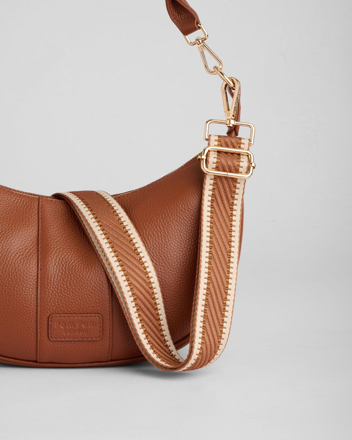 Sutton Sling Bag in Chestnut styled with free fabric strap and keyring | Pom Pom London